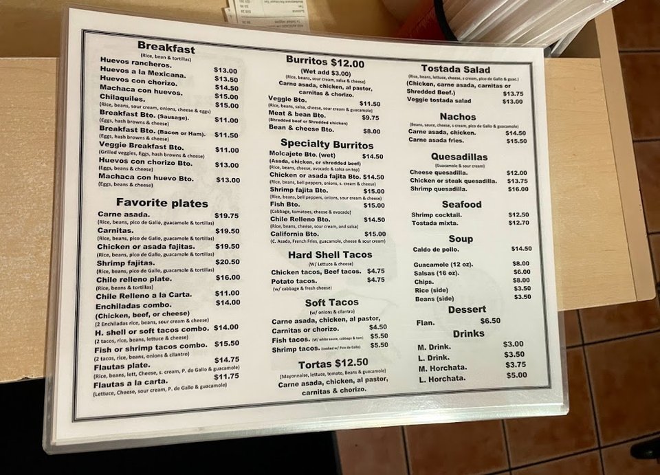 Printed menu showing familiar Mexican comfort food options.